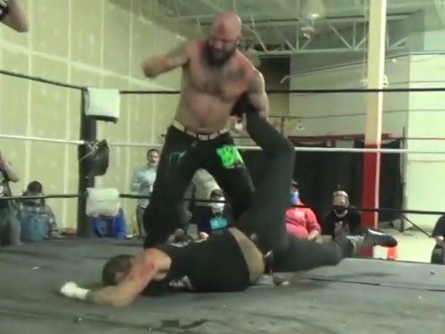 [Screenshot: Eric Ryan attempts a submission]