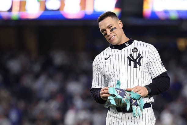 Aaron Judge of the New York Yankees walks off the field after being left on base during the eighth inning of Game Five of the 2024 World Series... Aaron Judge of the New York Yankees walks off the field after being left on base during the eighth inning of Game Five of the 2024 World Series...