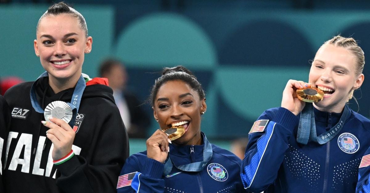 Why Do Olympians Bite Their Medals? The Tradition Explained