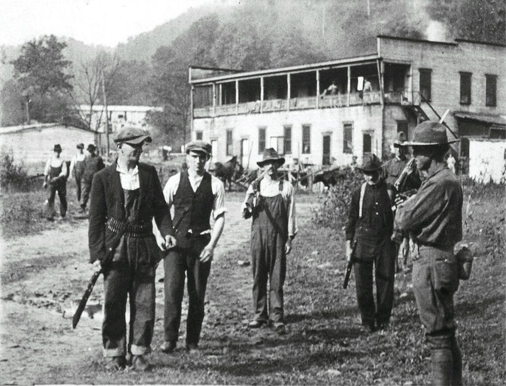 Union miners turning in their weapons to federal troops after the Battle of Blair Mountain, 1921. Kinograms, via Wikimedia Commons Union miners turning in their weapons to federal troops after the Battle of Blair Mountain, 1921. Kinograms, via Wikimedia Commons