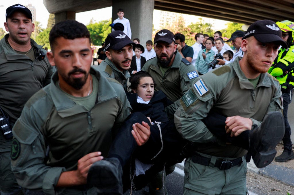 Israeli military warns it will begin drafting ultra-Orthodox men, move that  could split government | PBS News