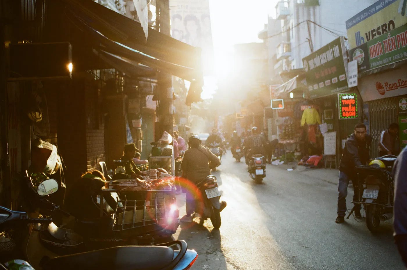 Busy streets of Hanoi filled with motorbikes Busy streets of Hanoi filled with motorbikes
