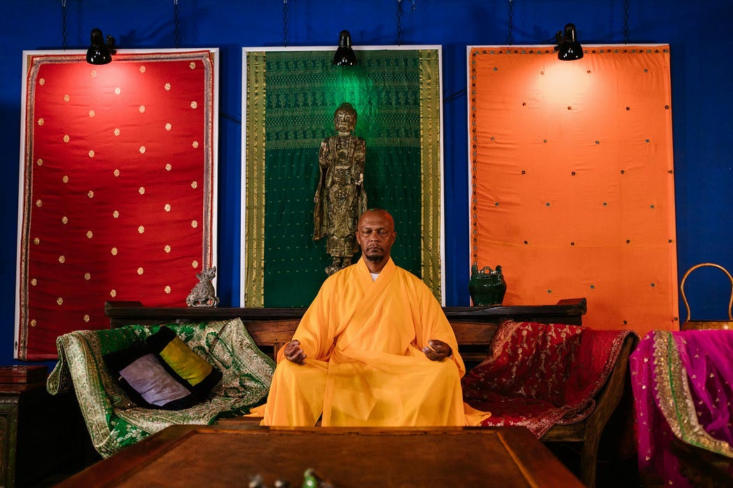 A Buddhist monk meditates in his special sacred space A Buddhist monk meditates in his special sacred space