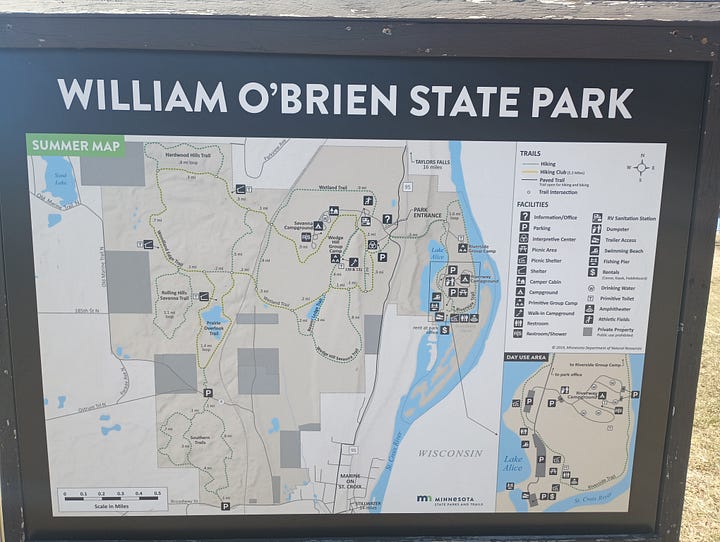 park map sign, start of trail sign, information about the things to see