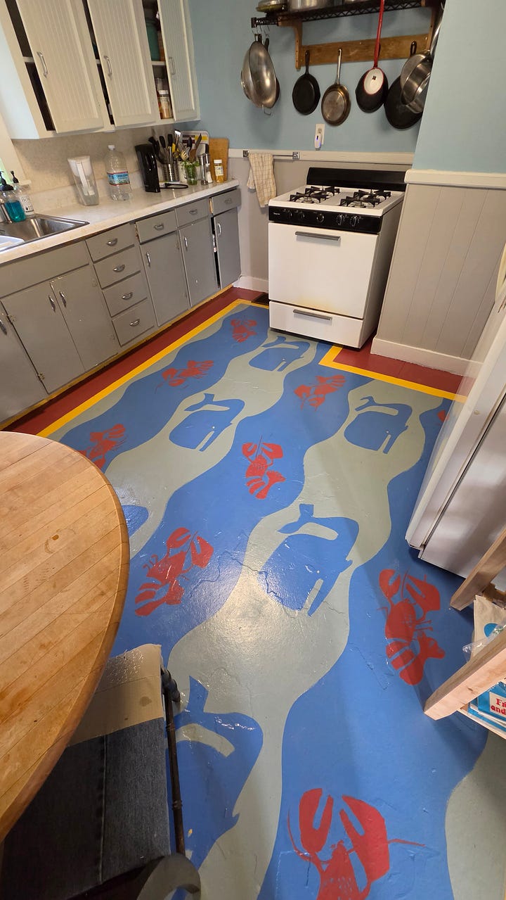floor painted with whales and lobsters