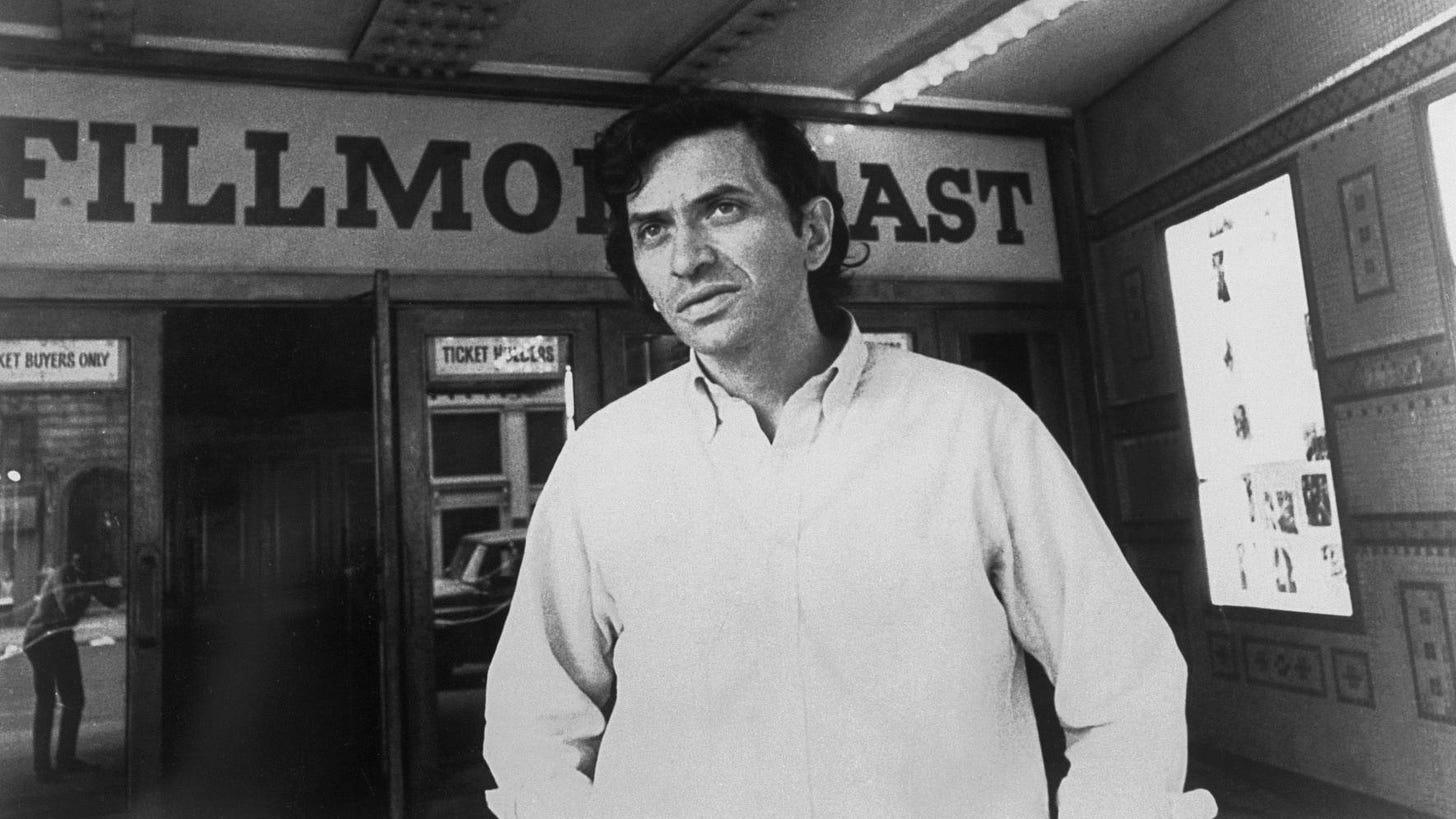 Bill Graham outside Fillmore East in New York