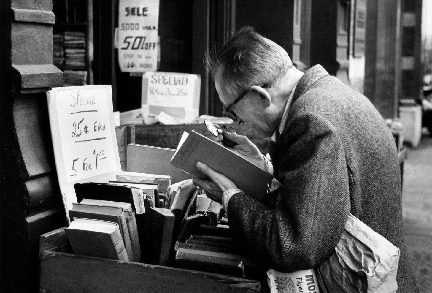 Boy reading newspaper, 1944 Photograph: André Kertész/Stephen Bulger gallery