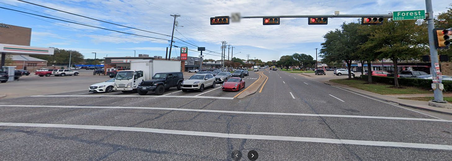 Intersection of Forest and Preston. A large suburban intersection.