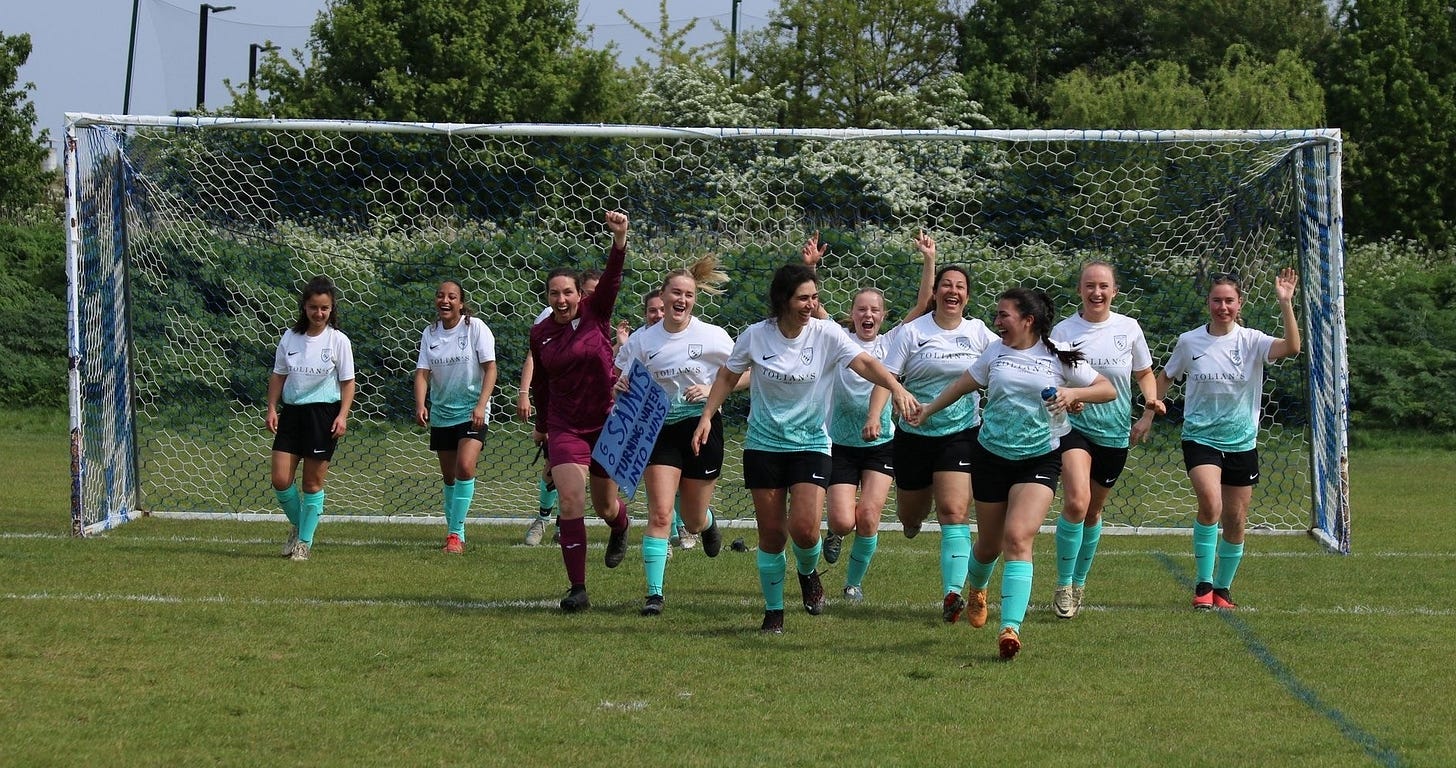 May be an image of 9 people, people playing American football, people playing football and grass