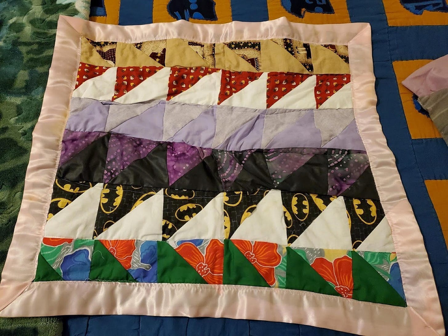 A picture containing clothing, bedding

Description automatically generated