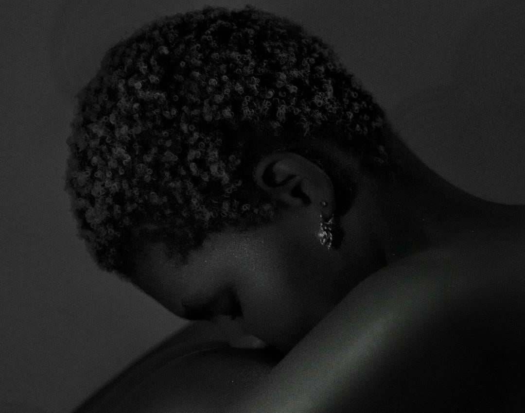 grayscale photo of topless woman grayscale photo of topless woman