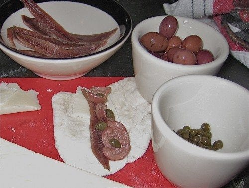 anchovies, Gaeta olives, capers, Asiago anchovies, Gaeta olives, capers, Asiago