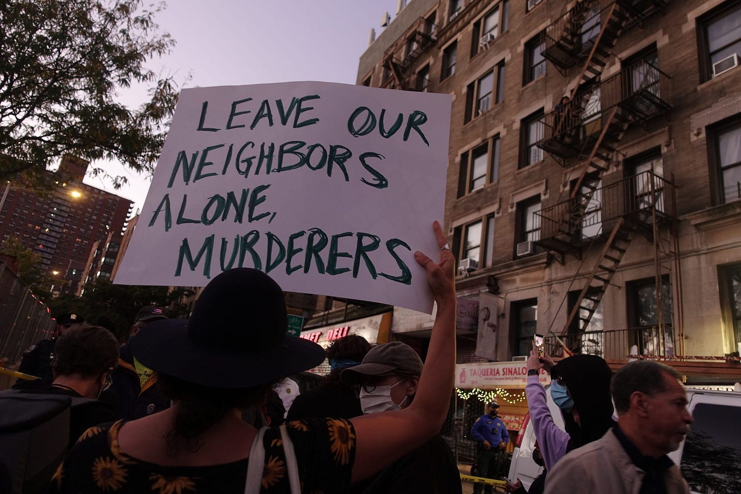 Protesters converge on West 225th Street in Marble Hill after a person was shot by federal officers, Oct. 8, 2026. (Gwynne Hogan, The City Reporter)