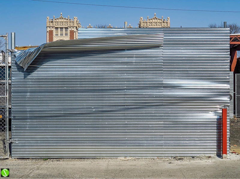 2019 photo by Steve Butcher of peeled back roll gate in Brooklyn