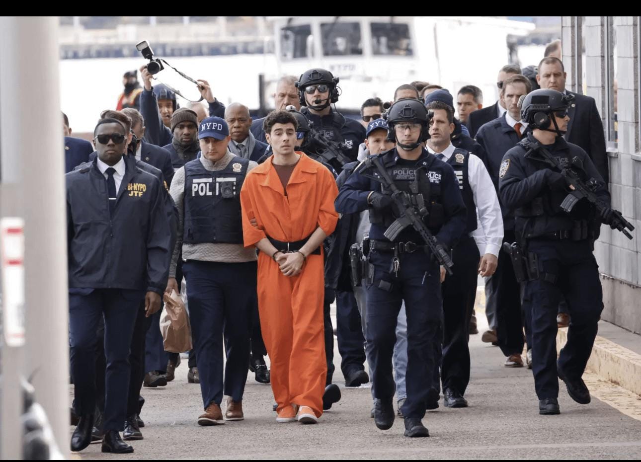 r/heightcomparison - politician walks with other law enforcement officials.