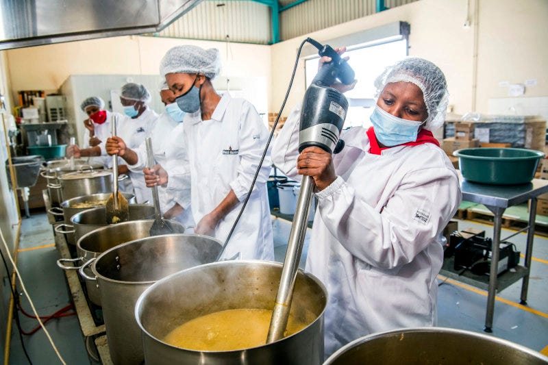 Employees at Black Mamba's factory. Employees at Black Mamba's factory.