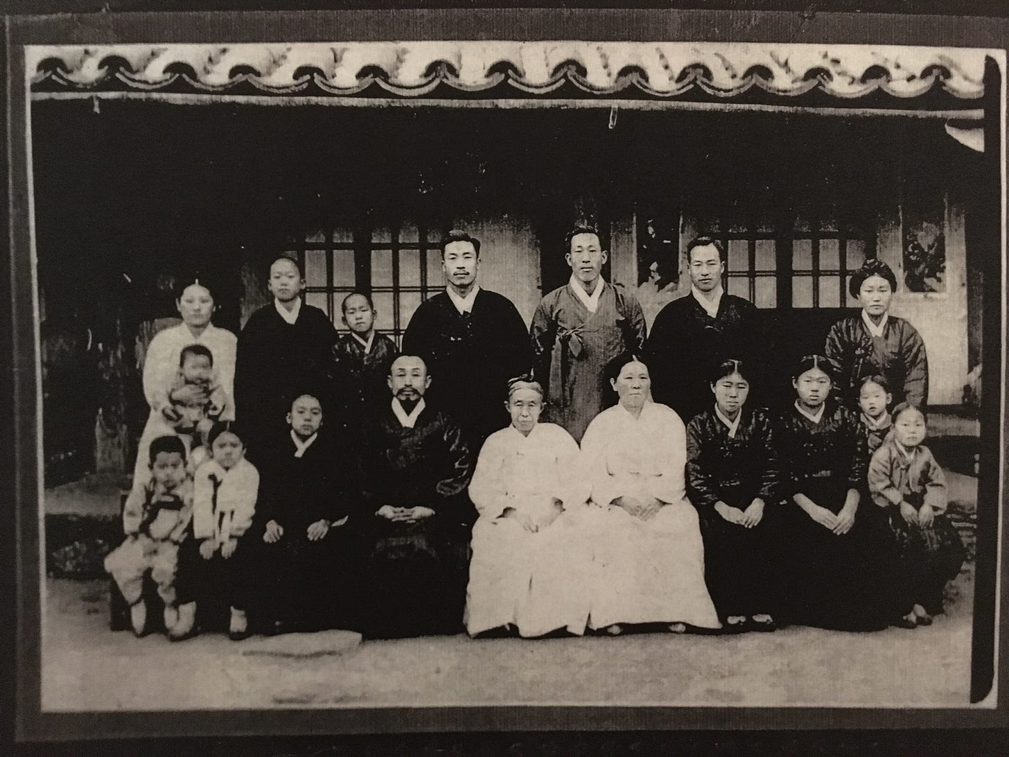 early 20th century black and white photograph of my family in Korea (back then this was North Korea). Great great grandparents, great grandparents, grandfather, and great uncles...