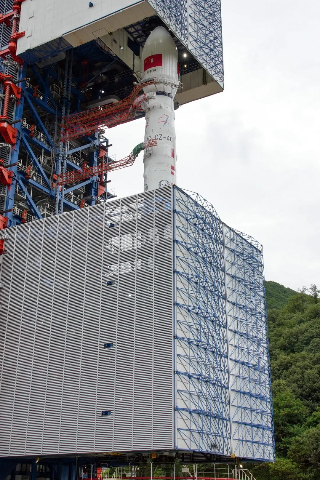 The Long March 4C Y64 vehicle at the Xichang Satellite Launch Center prior to launch. The Long March 4C Y64 vehicle at the Xichang Satellite Launch Center prior to launch.