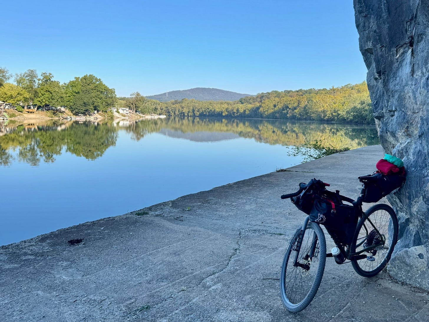 Loaded gravel bike resting beside the C&O Canal during a bikepacking trip to Lockhouse 49.