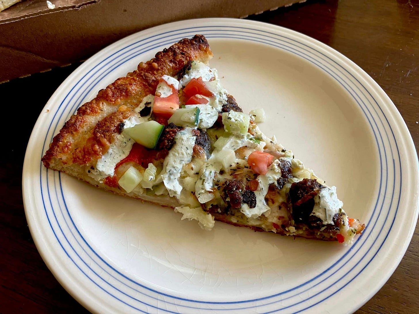 May be an image of gyro and pizza