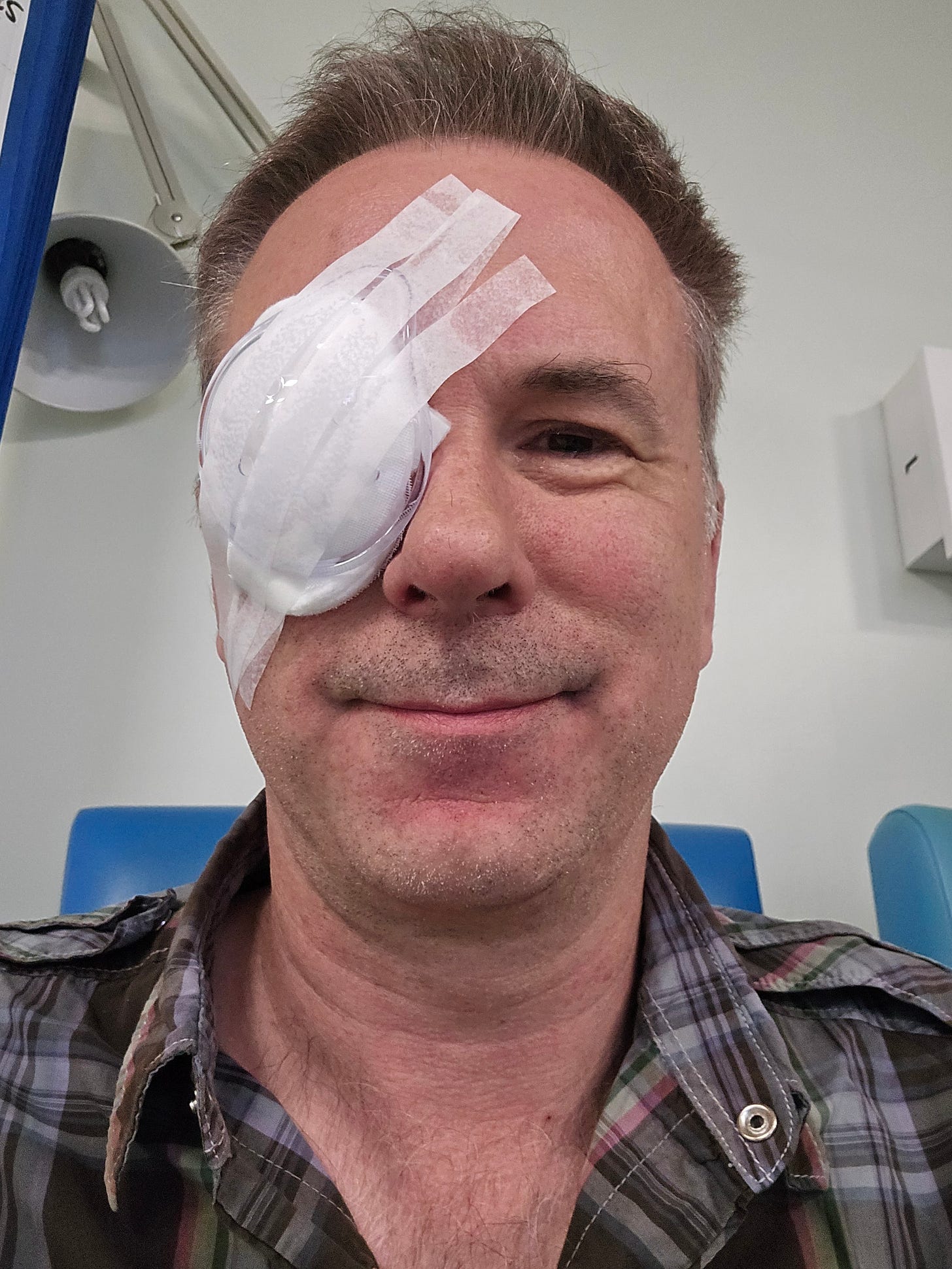 Spencer wearing a surgical eye patch
