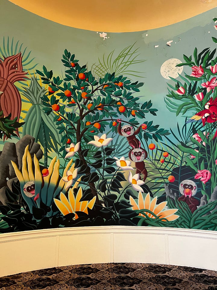 Murals in the lobby of the Arlington hotel