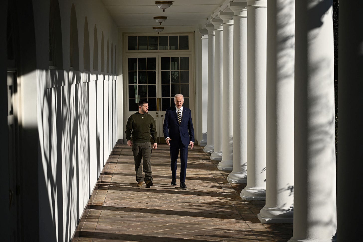 Ukrainian President Volodymyr Zelensky and US President Joe Biden walk through the White House colonnade on Wednesday. Ukrainian President Volodymyr Zelensky and US President Joe Biden walk through the White House colonnade on Wednesday.