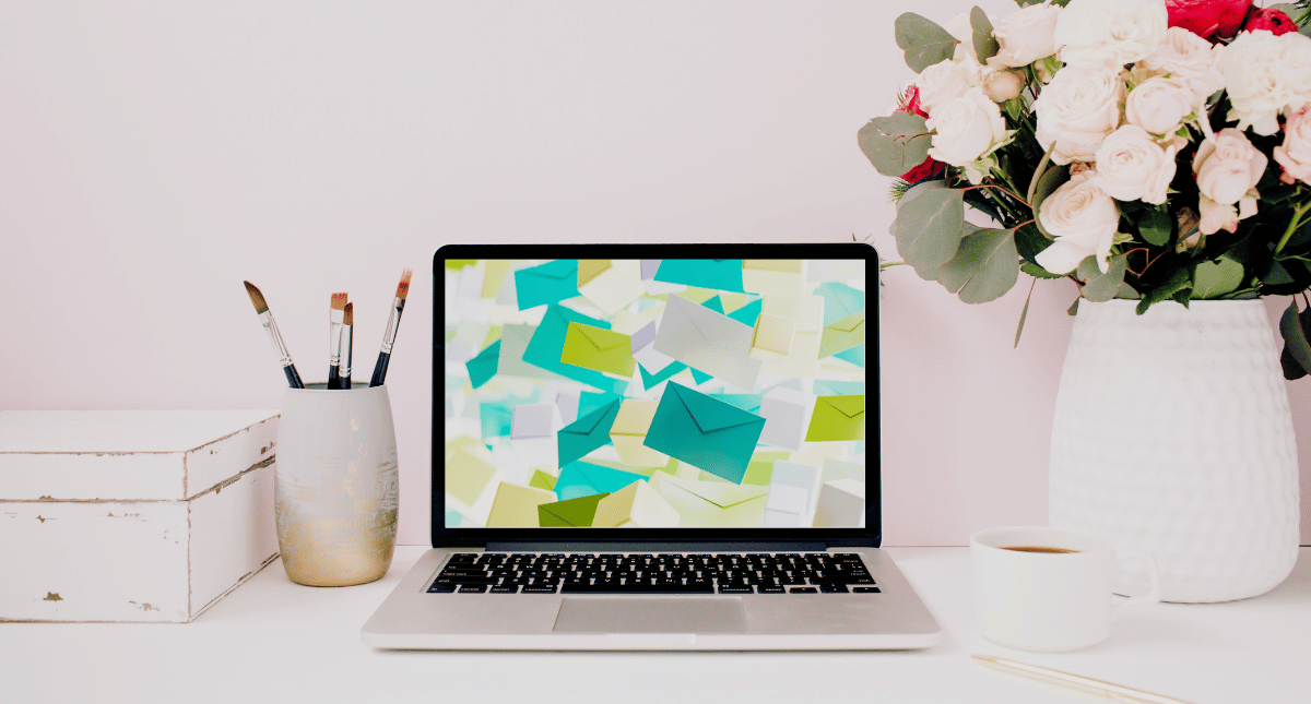 Laptop sitting on a desk, being spammed with emails Laptop sitting on a desk, being spammed with emails