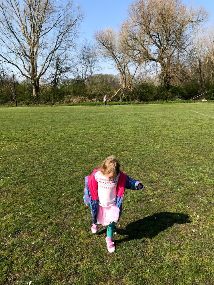 Photograph of a girl playing on Warren Avenue Playing Fields