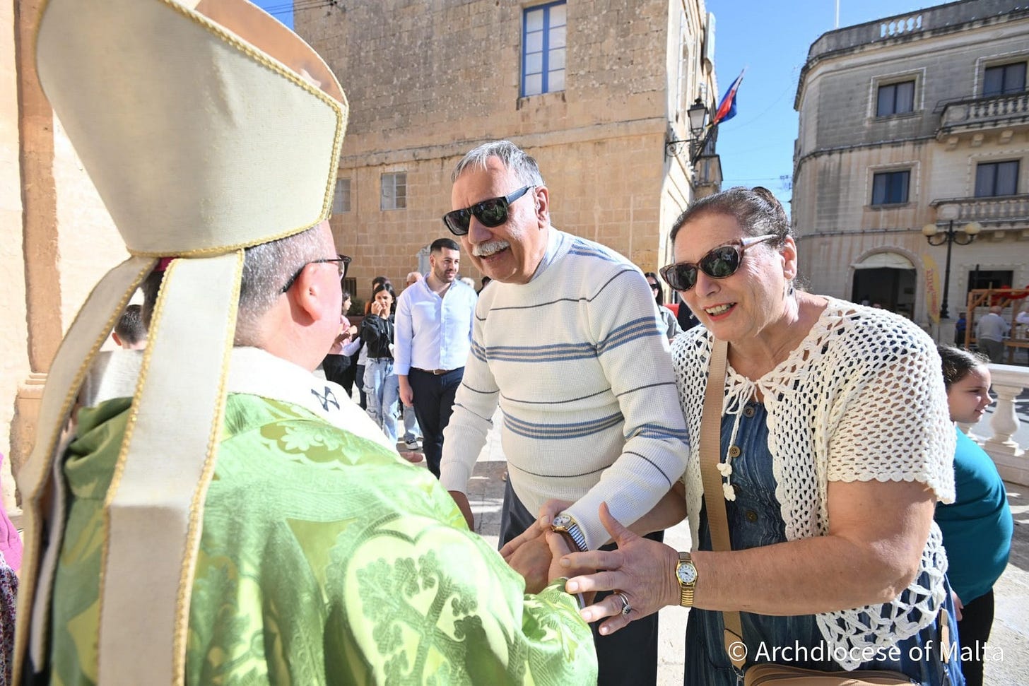 May be an image of one or more people and text