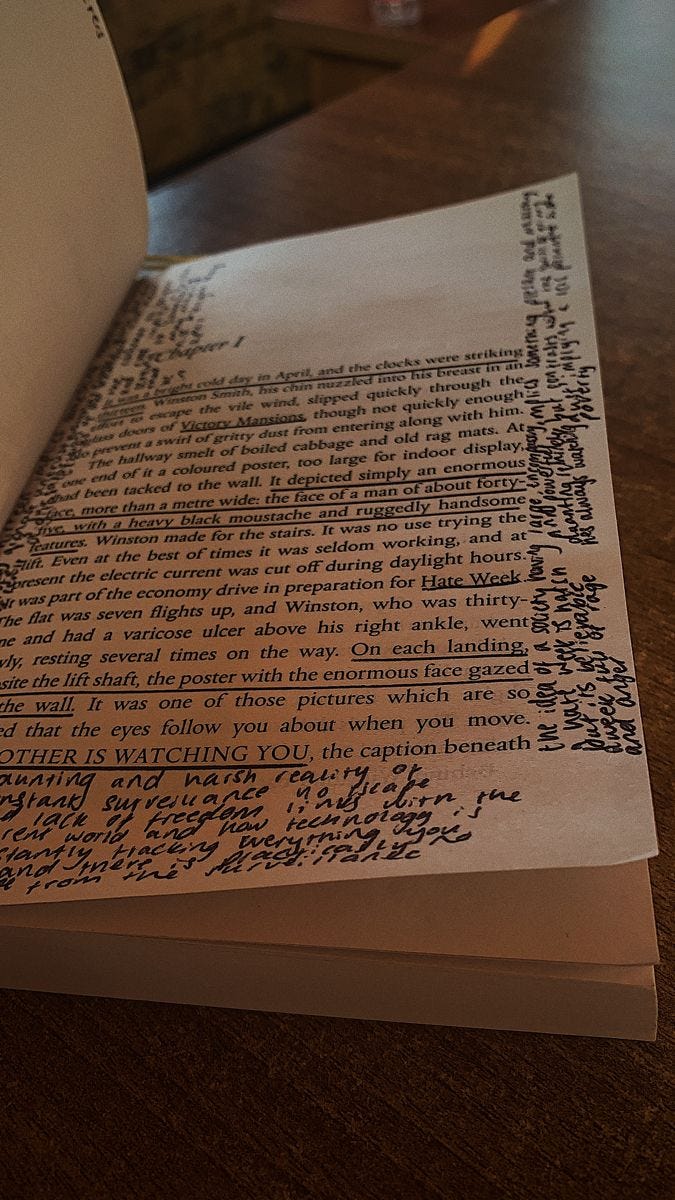 This may contain: an open book sitting on top of a wooden table