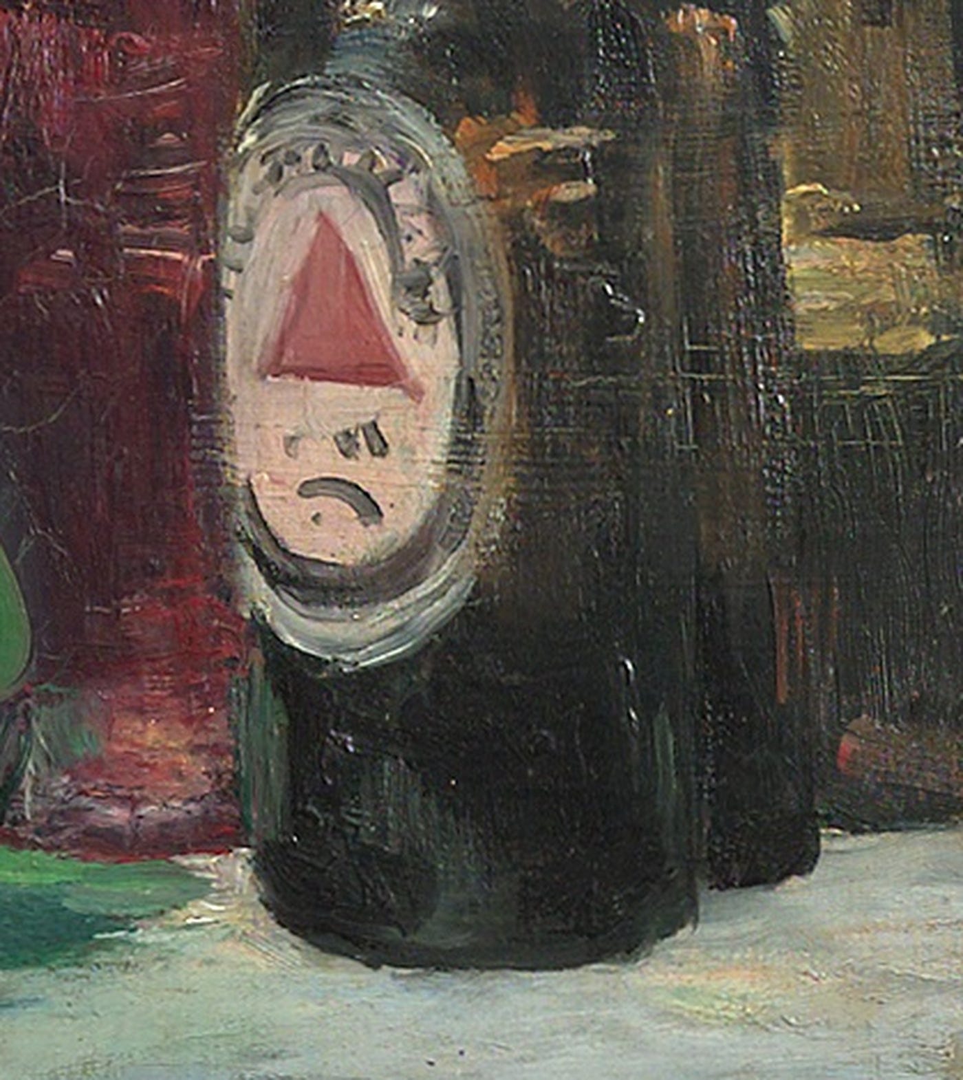 Detail of Manet's A Bar at the Folies Bergère: a bottle of Bass pale ale with its red triangle trademark on the marble counter. Detail of Manet's A Bar at the Folies Bergère: a bottle of Bass pale ale with its red triangle trademark on the marble counter.