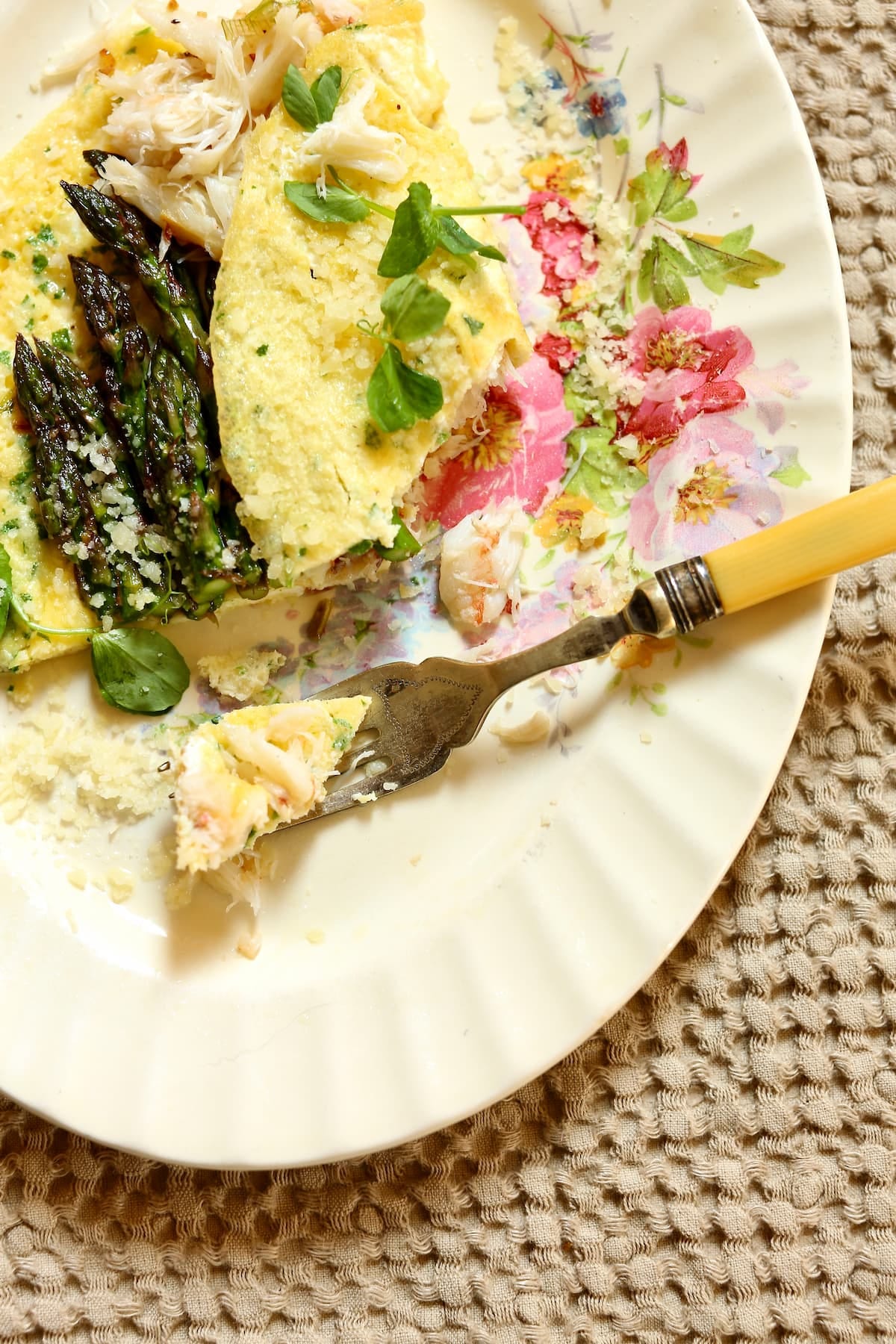 a close up photo of a half-eaten omelette.