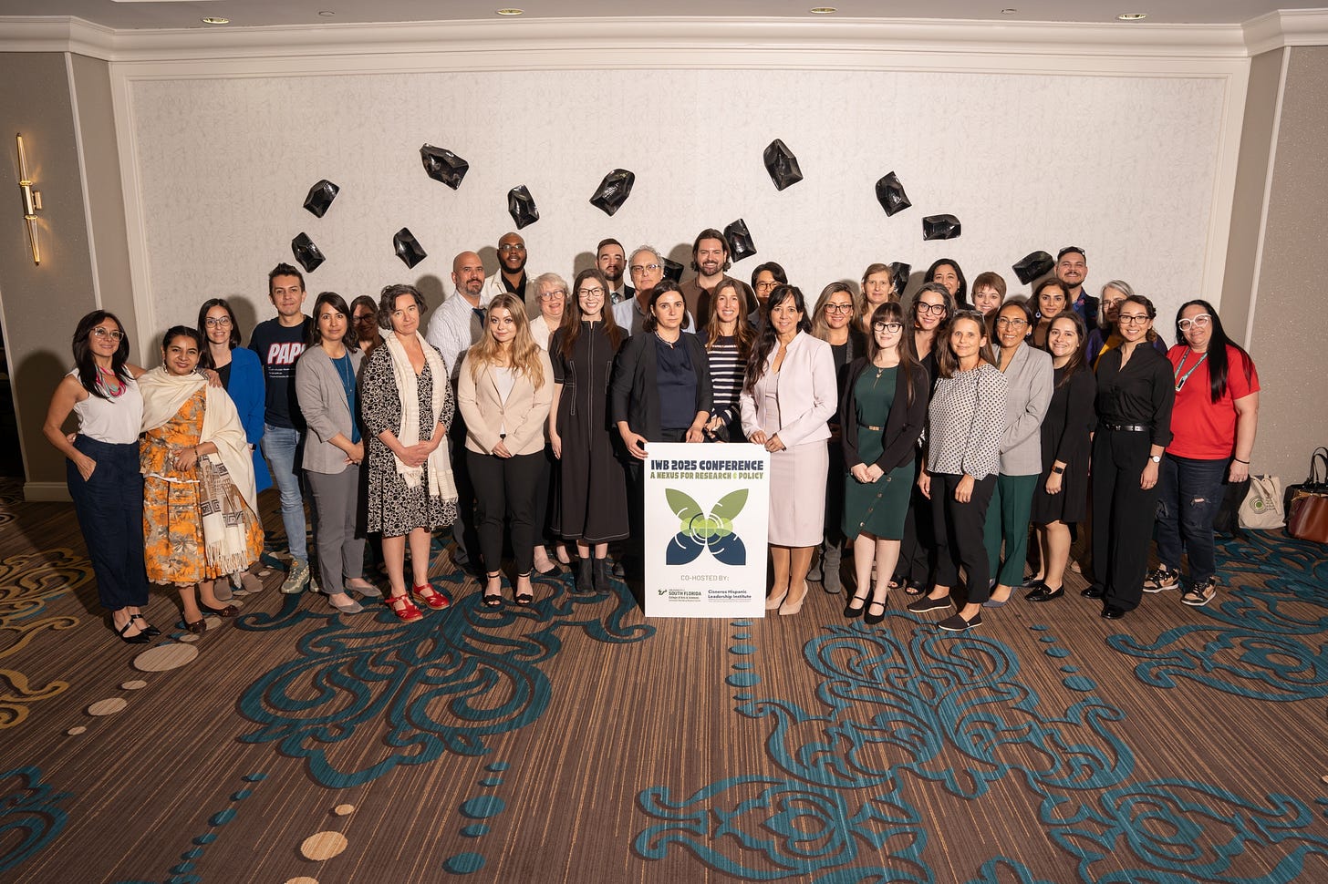 A group of people posing for a photo

AI-generated content may be incorrect.