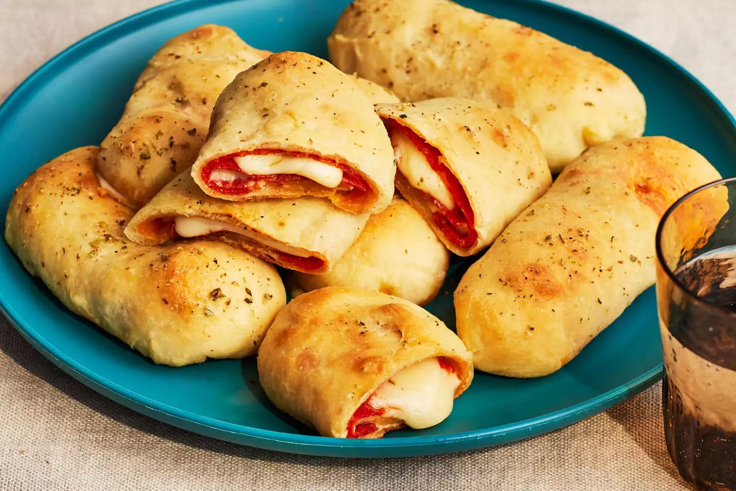 West Virginia Pepperoni Rolls on a plate to serve West Virginia Pepperoni Rolls on a plate to serve