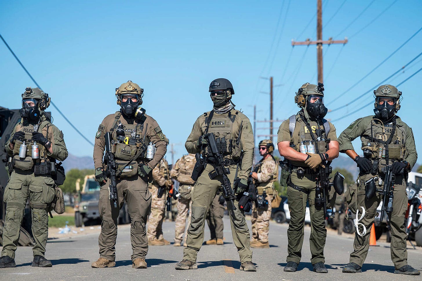 U.S. historians say the visuals of masked ICE agents detaining workers  match Klan era tactics | Milwaukee Independent