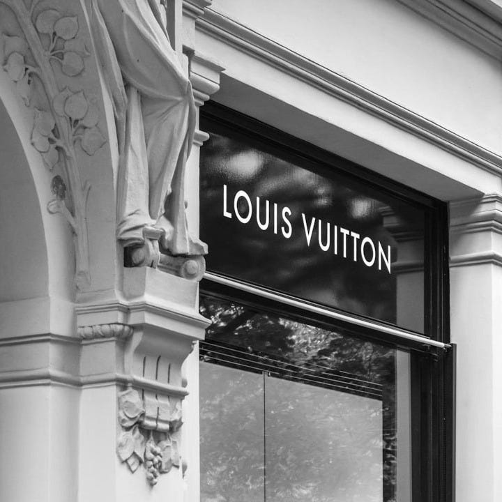 Louis Vuitton boutique signage on building
