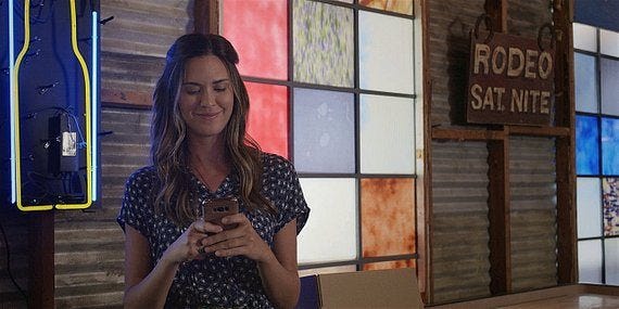 Walker Geri smiles as she texts flirty with Cordell Walker Geri smiles as she texts flirty with Cordell