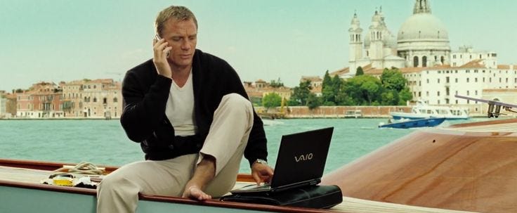Still from Casino Royale (2006) featuring James Bond using a Sony VAIO laptop. Also his bare feet are out and he's lounging in a boat by a beautiful body of water but that's not the point of this photo.