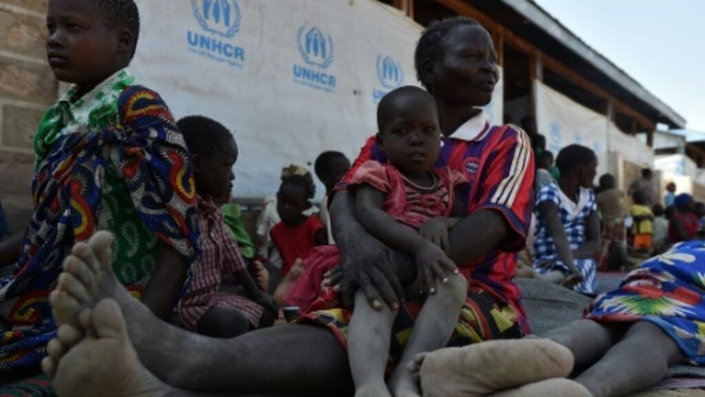 Refugees from South Sudan waiting for food rations at the Kakuma refugee complex in Kenya after fleeing the violence and worsening humanitarian situation in their homeland.