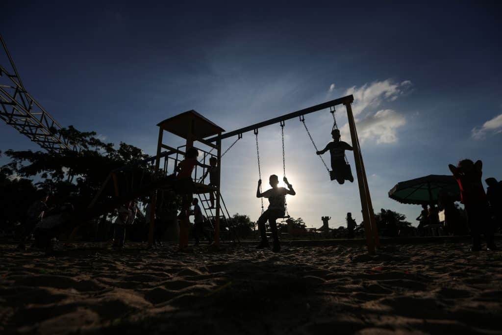 Palestinians celebrate on the third day of Eid al-Adha at a park in Khan Younis in the southern Gaza strip, July 11, 2022. (Photo: Mohammed Dahman/APA Images)