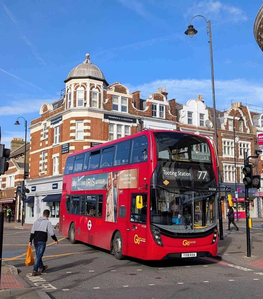 May be an image of tram and text