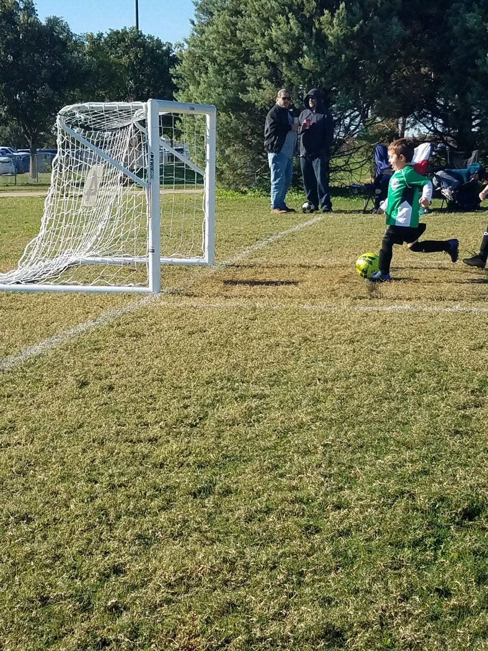 Little boy playing soccer