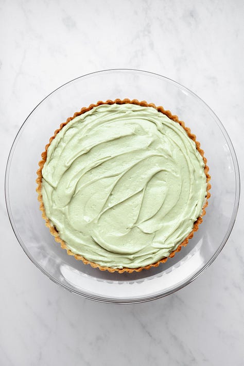 Fresh strawberry pistachio tart with pistachio praline and pistachio pastry cream