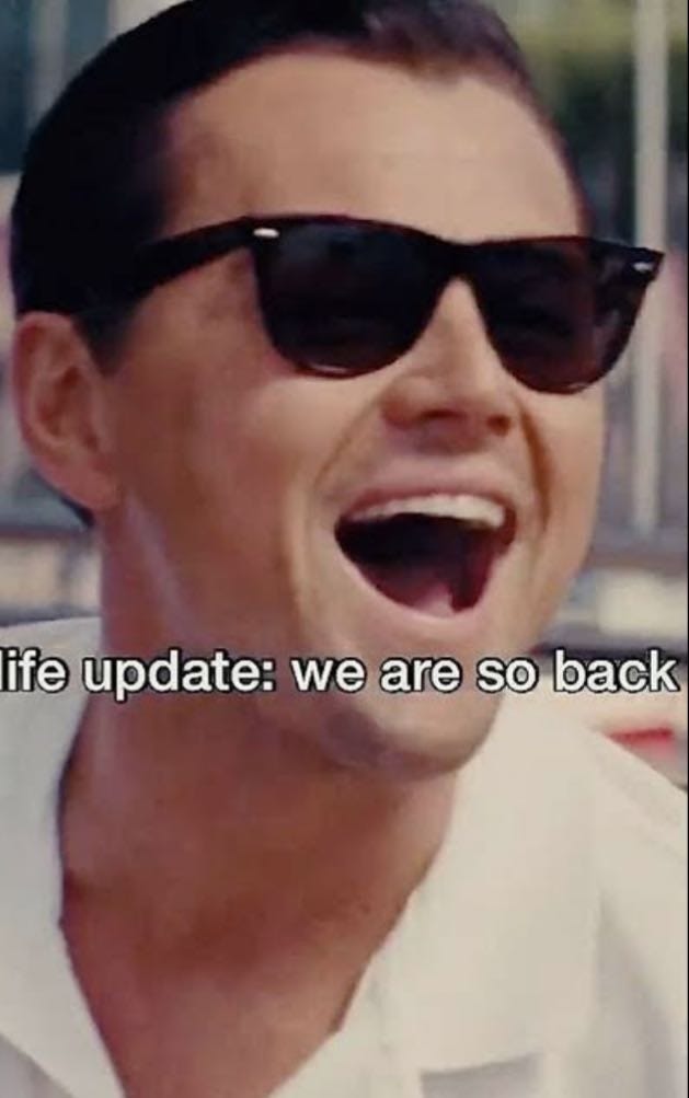 Leonardo DiCaprio in sunglasses laughing with his mouth wide open, captioned "life update: we are so back."