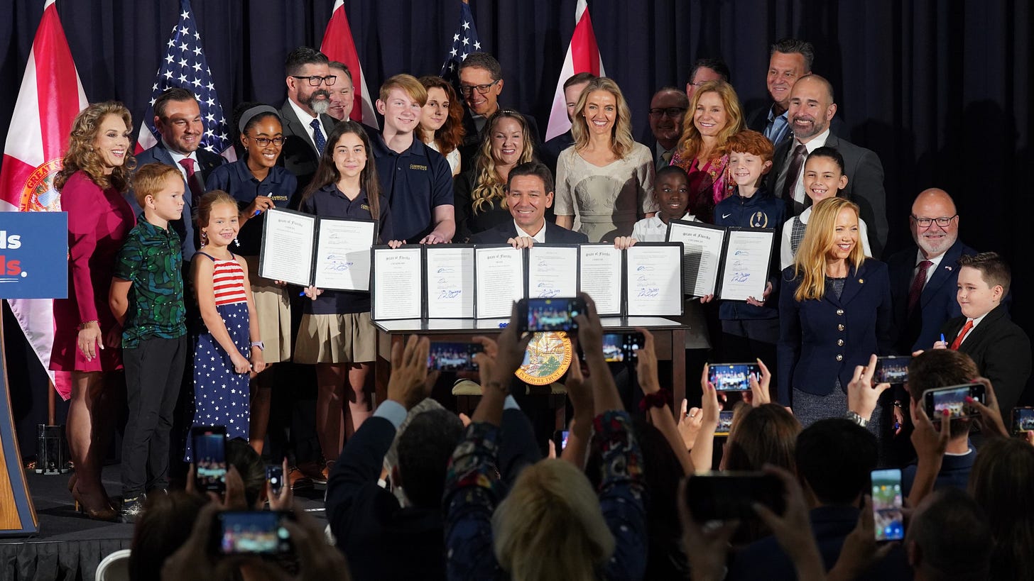 DeSantis signs bills targeting drag shows, pronouns, bathroom use and  transgender children | WEAR