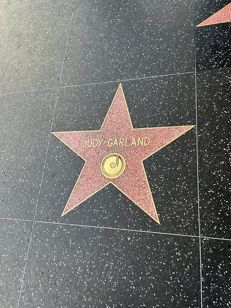 Judy Garland's star, the Dolby Theater, the handprints outside of Grauman's, a small Hollywood sign, the real Hollywood sign in the distance, and another view of the Hollywood sign