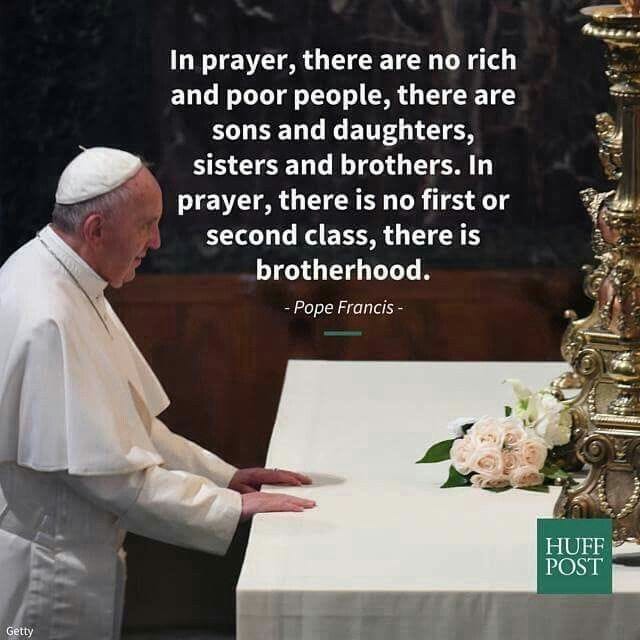 This may contain: the pope is standing in front of a table with flowers on it and a quote from pope francis