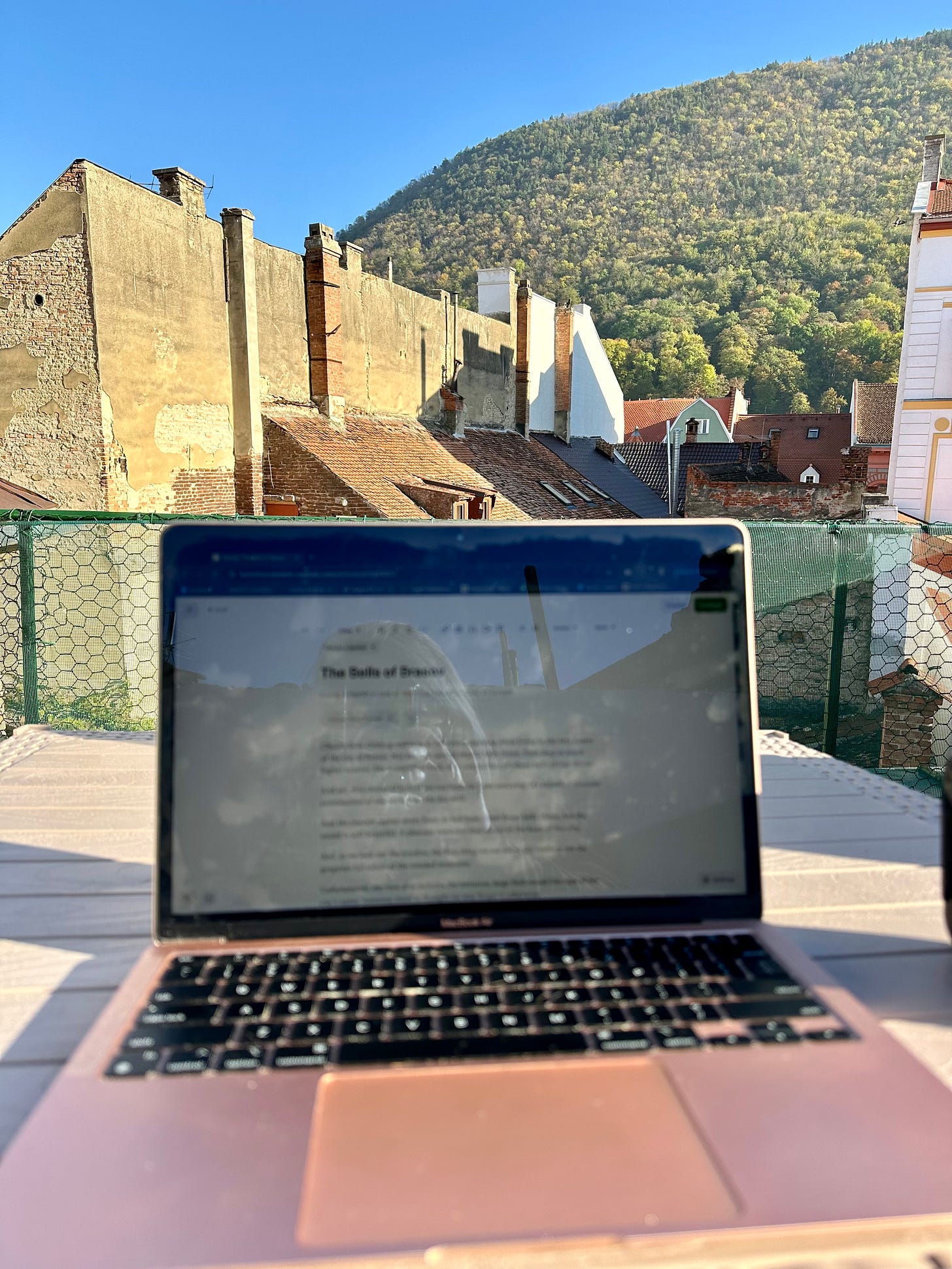 Writing on the rooftop balcony in Brasov