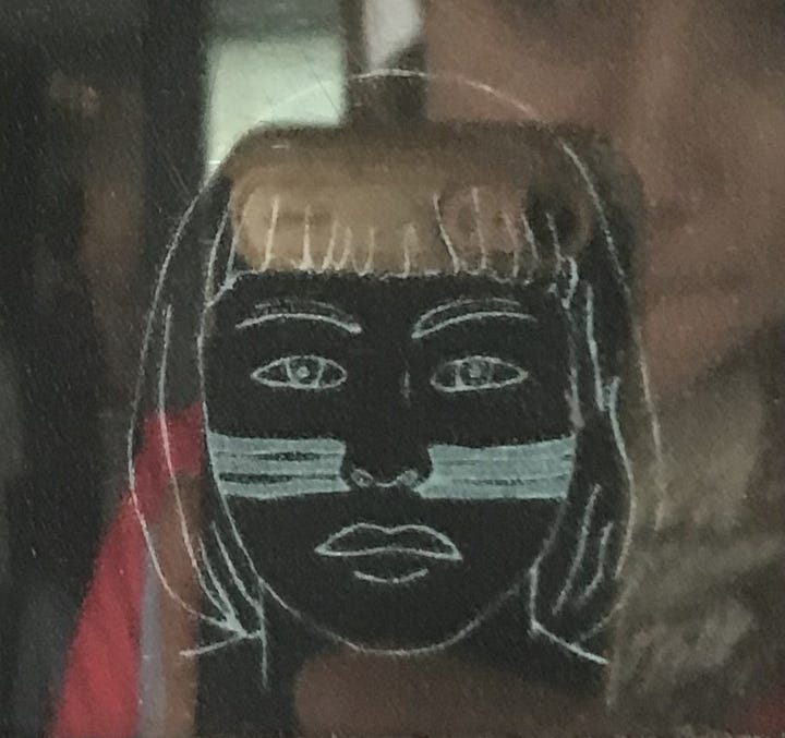 Pencil sketches show different patterns of vertical and horizontal lines in face paint.